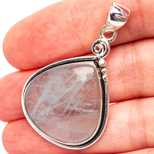 Aquamarine teardrop pendant in .925 sterling silver with bail and ornate frame