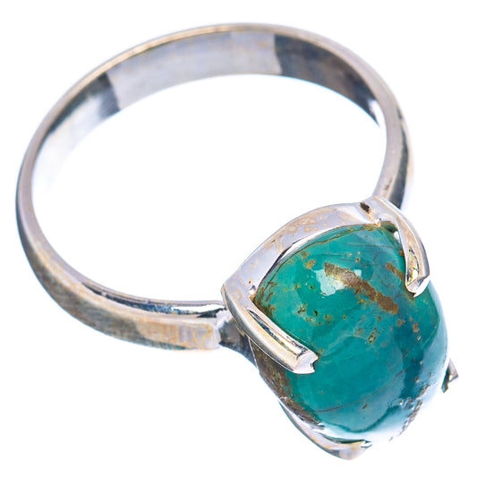Sterling silver ring with turquoise oval cabochon and angled view of band