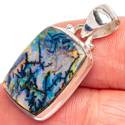 Sterling silver opal pendant with rectangular rainbow-blue stone bezel