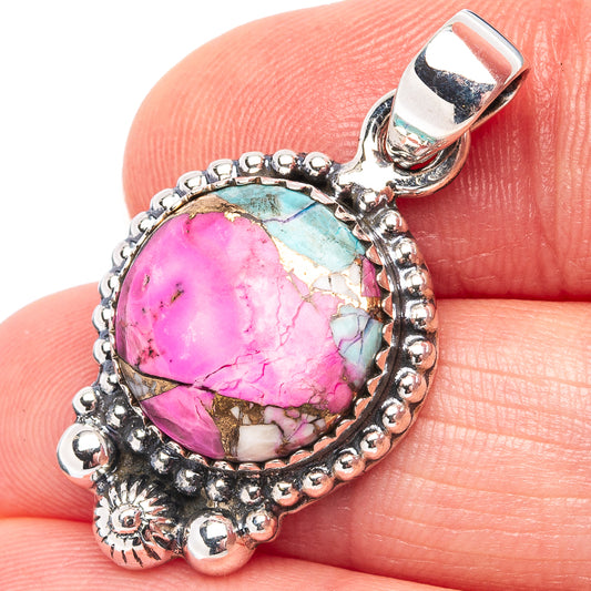 Oval magenta turquoise stone pendant in .925 sterling silver, ornate frame and bail