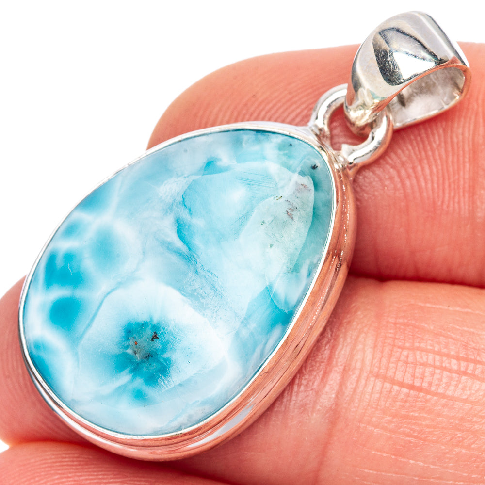 Close-up oval Larimar pendant with 925 sterling silver frame and bail