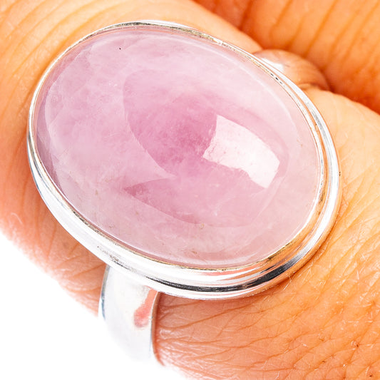 Sterling silver ring with oval pink kunzite gemstone in a polished bezel setting