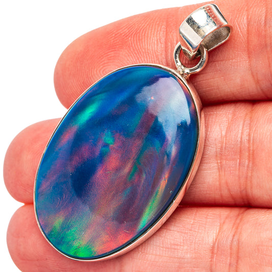 Oval opal pendant in blue, green, and purple with .925 sterling silver bezel and bail