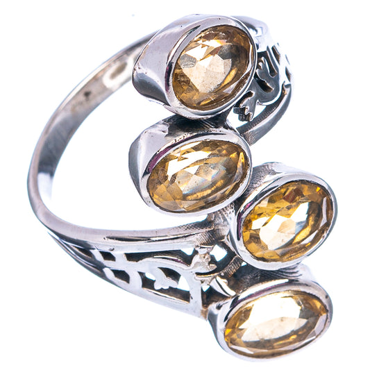 Oval faceted citrine sterling silver ring with scrollwork side and stacked gemstone bezel
