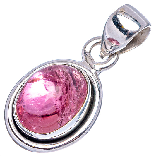 Oval pink tourmaline pendant with sterling silver frame and loop bail