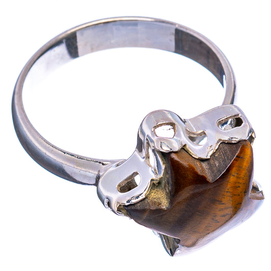 Sterling silver star ring with tiger's-eye cabochon and claw prongs
