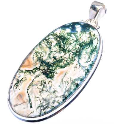 Oval green moss agate pendant in silver setting with bail.