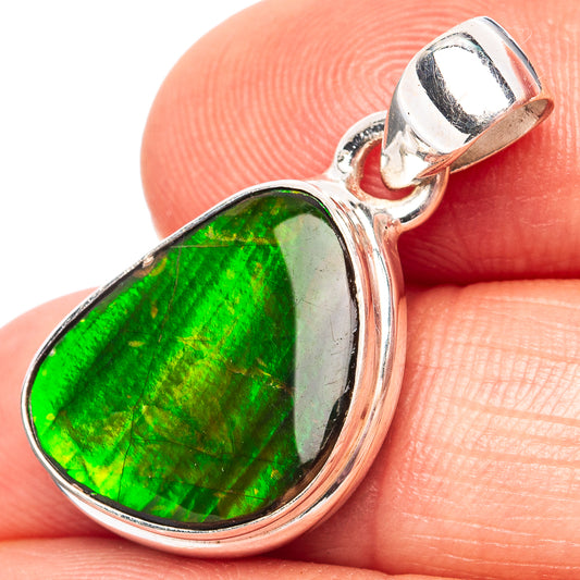 Sterling silver ammolite pendant with teardrop green iridescent stone, close-up bail