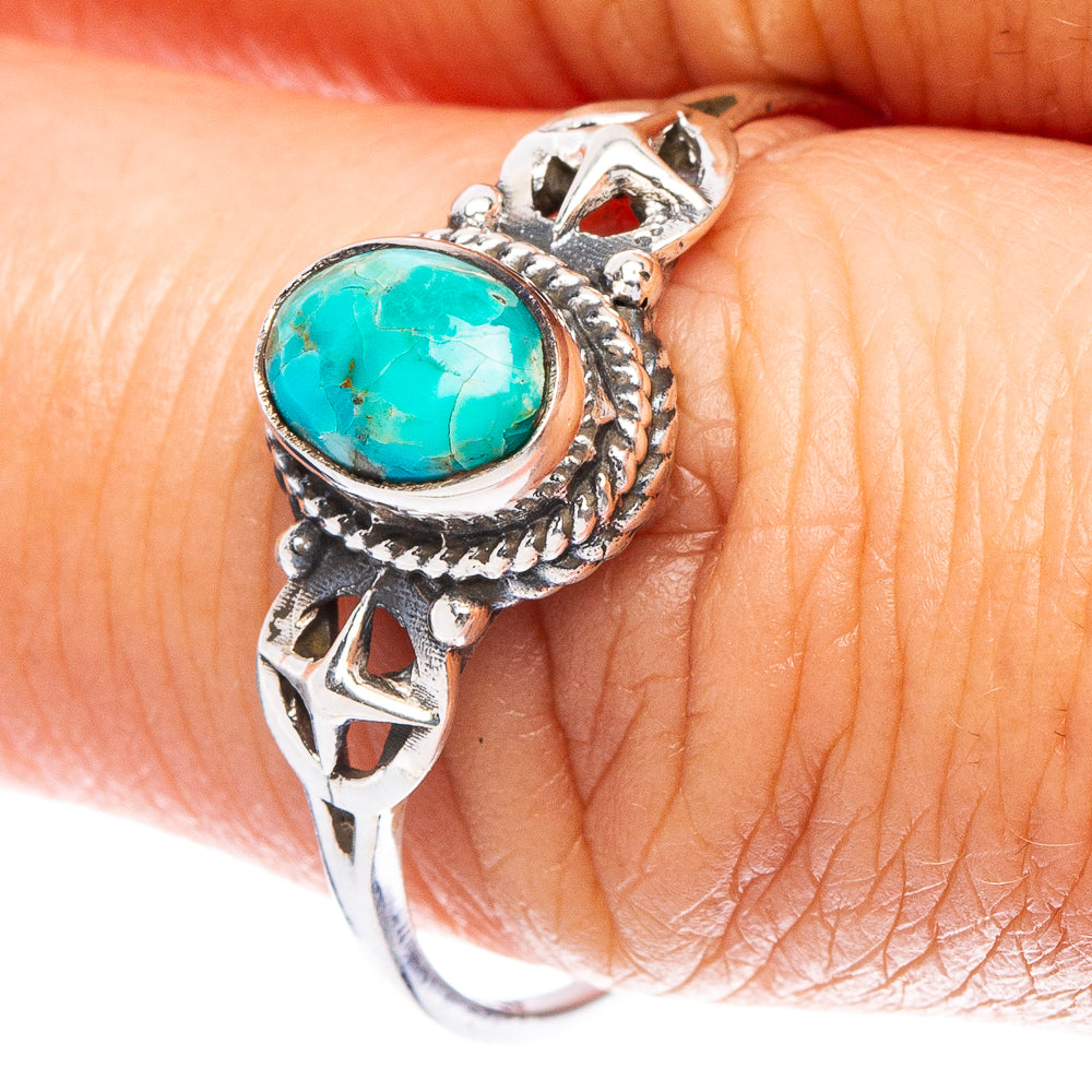 925 sterling silver ring with oval turquoise cabochon and rope-style bezel