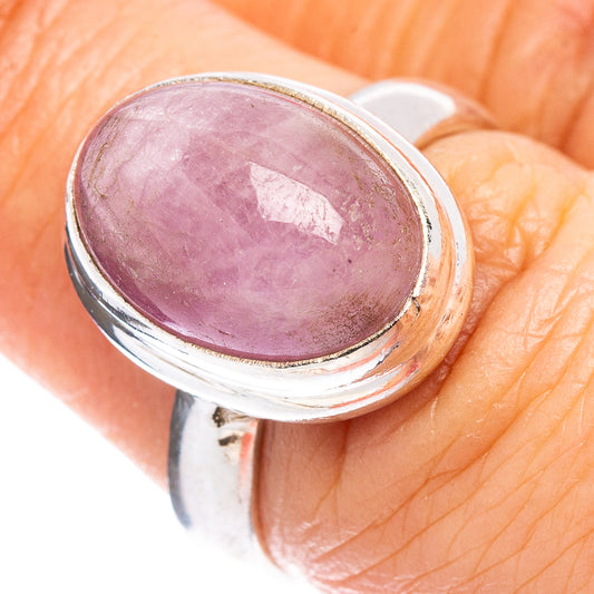 Sterling silver kunzite ring with oval purple-pink gemstone in domed bezel