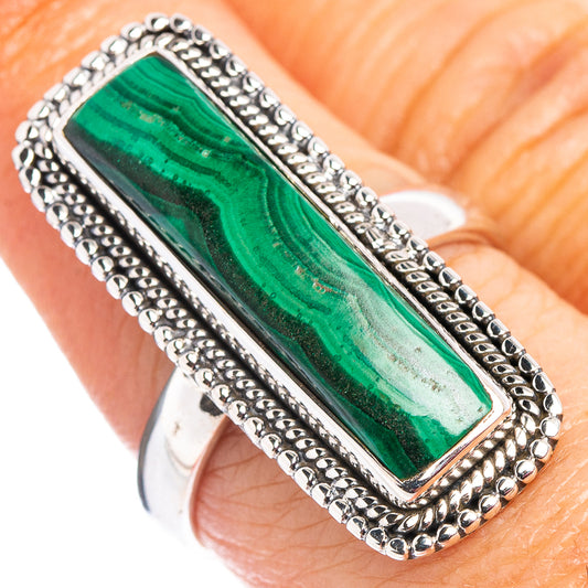 Sterling silver ring with rectangular green malachite stone and beaded border