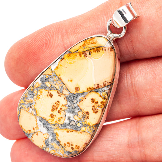 Teardrop jasper pendant in .925 sterling silver with orange, yellow, and blue stone