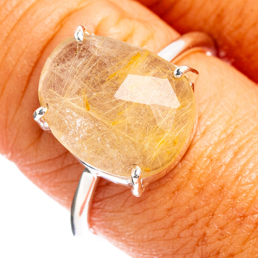 Faceted rutilated quartz ring in .925 sterling silver, oval stone with prong setting