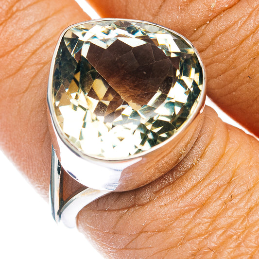 Sterling silver ring with oval faceted green amethyst, close-up
