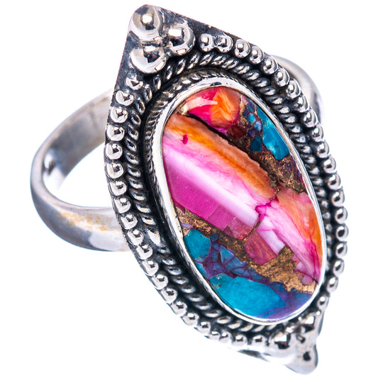 Oval turquoise, pink, and orange cabochon ring with ornate sterling silver band