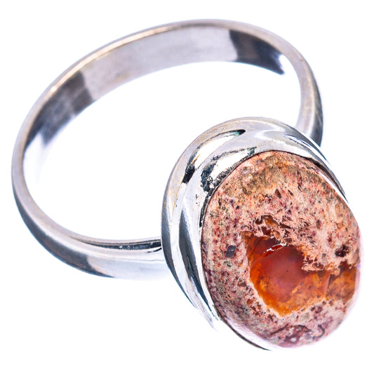 Sterling silver fire opal ring, oval bezel with orange-red gemstone in speckled matrix
