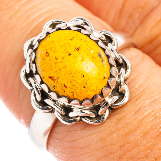 Sterling silver ring with oval yellow jasper cabochon in twisted silver frame