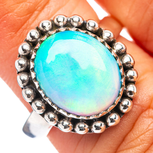 Turquoise opal bezel ring in .925 sterling silver with round beaded halo, size 6.75