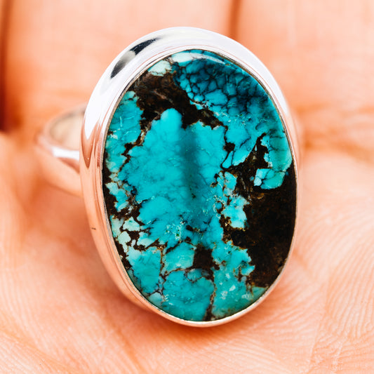 Oval turquoise cabochon sterling silver ring, side view