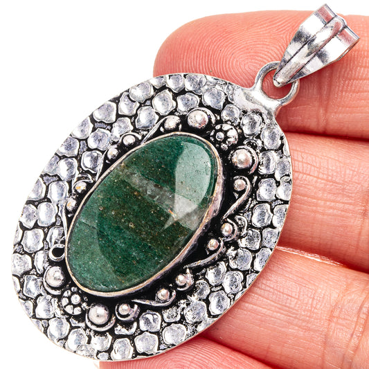 Green aventurine pendant with oval gemstone set in textured German silver frame