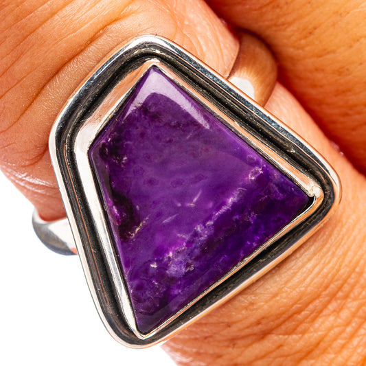 Sterling silver ring with purple sugilite triangle gemstone in raised bezel
