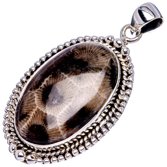 Sterling silver oval pendant with fossil coral stone, rope-like border, and loop bail