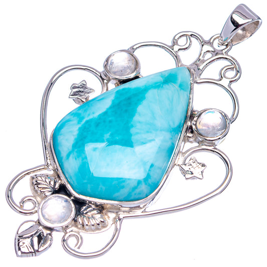 Sterling silver blue teardrop gemstone pendant with filigree and round iridescent accents