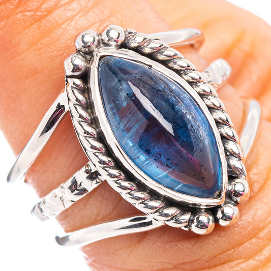 Sterling silver kyanite ring with oval blue gemstone and ornate bezel, size 6.5