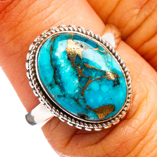 Sterling silver ring with oval blue turquoise cabochon and ornate rope bezel