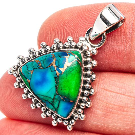 Sterling silver pendant with turquoise-green teardrop stone and bead border bail