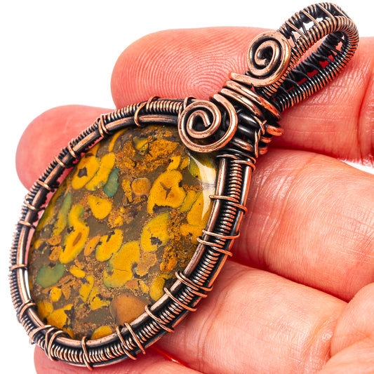 Bamboo jasper wire wrap pendant, oxidized copper spiral frame with oval stone