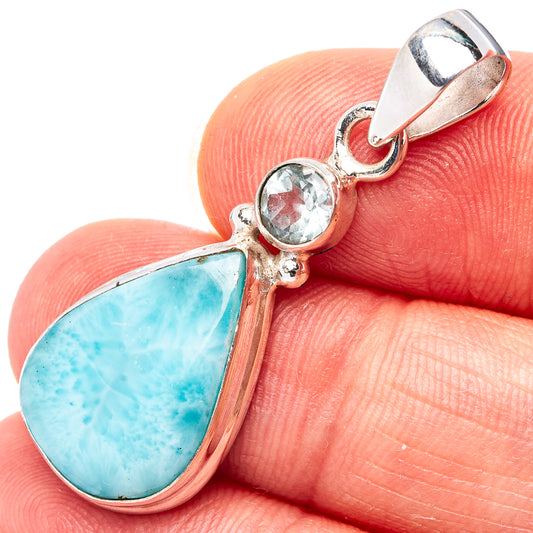 Sterling silver pendant with pear-shaped larimar and round blue topaz