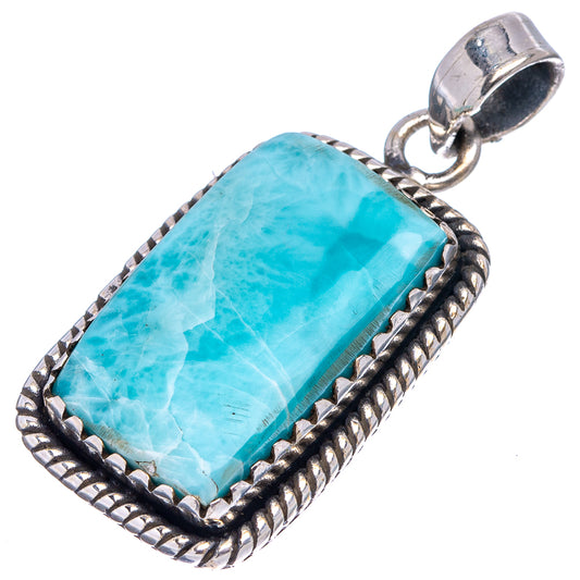 Sterling silver pendant with turquoise rectangular stone and top bail loop, rope border