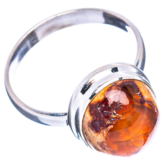 Sterling silver ring with oval fire opal cabochon, orange amber and dark marbling
