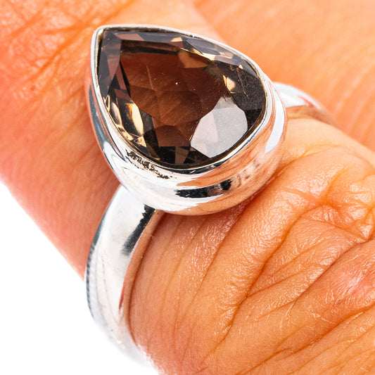 Faceted smoky quartz ring with dark teardrop gemstone and sterling silver band
