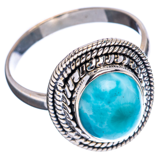 Sterling silver ring with oval turquoise larimar stone and rope border detail