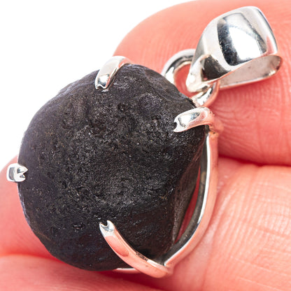925 sterling silver pendant with black raw stone and openwork bail, close-up