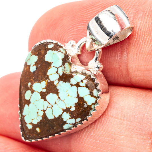 Turquoise heart pendant in .925 sterling silver bezel with silver bail
