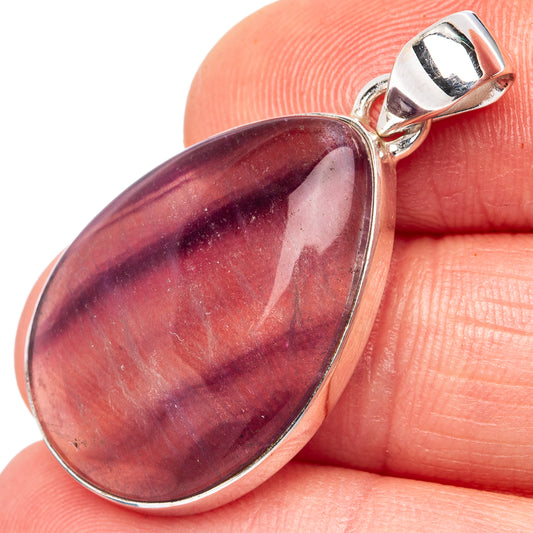 Fluorite pendant in teardrop silver bezel with hinged bail, polished purple stone