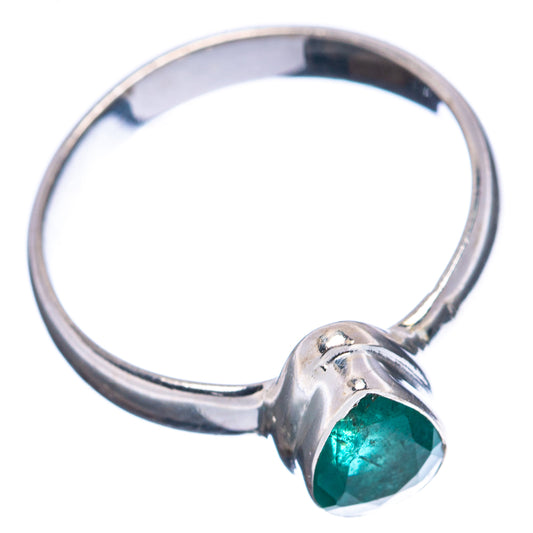 Size 6 sterling silver ring with bezel-set green emerald oval, side view