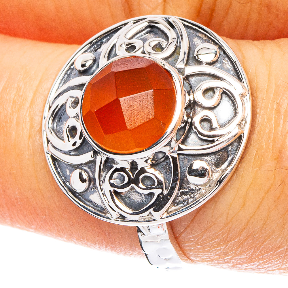 925 sterling silver ring with ornate filigree and oval orange carnelian gemstone