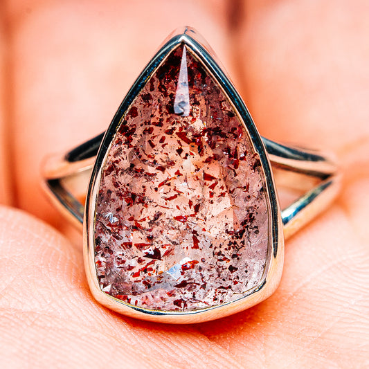 Sterling silver teardrop marquise lepidocrocite ring, open band with red glitter center.