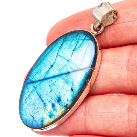 Blue labradorite teardrop pendant in .925 sterling silver bezel, loop bail