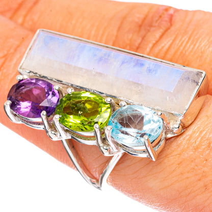 Sterling silver gemstone ring with purple, green, and blue oval stones in prong setting