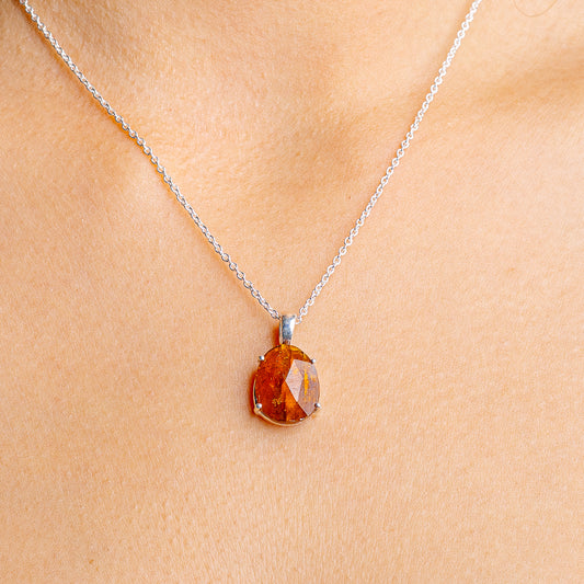 Orange kyanite pendant necklace with .925 sterling silver chain and oval gemstone
