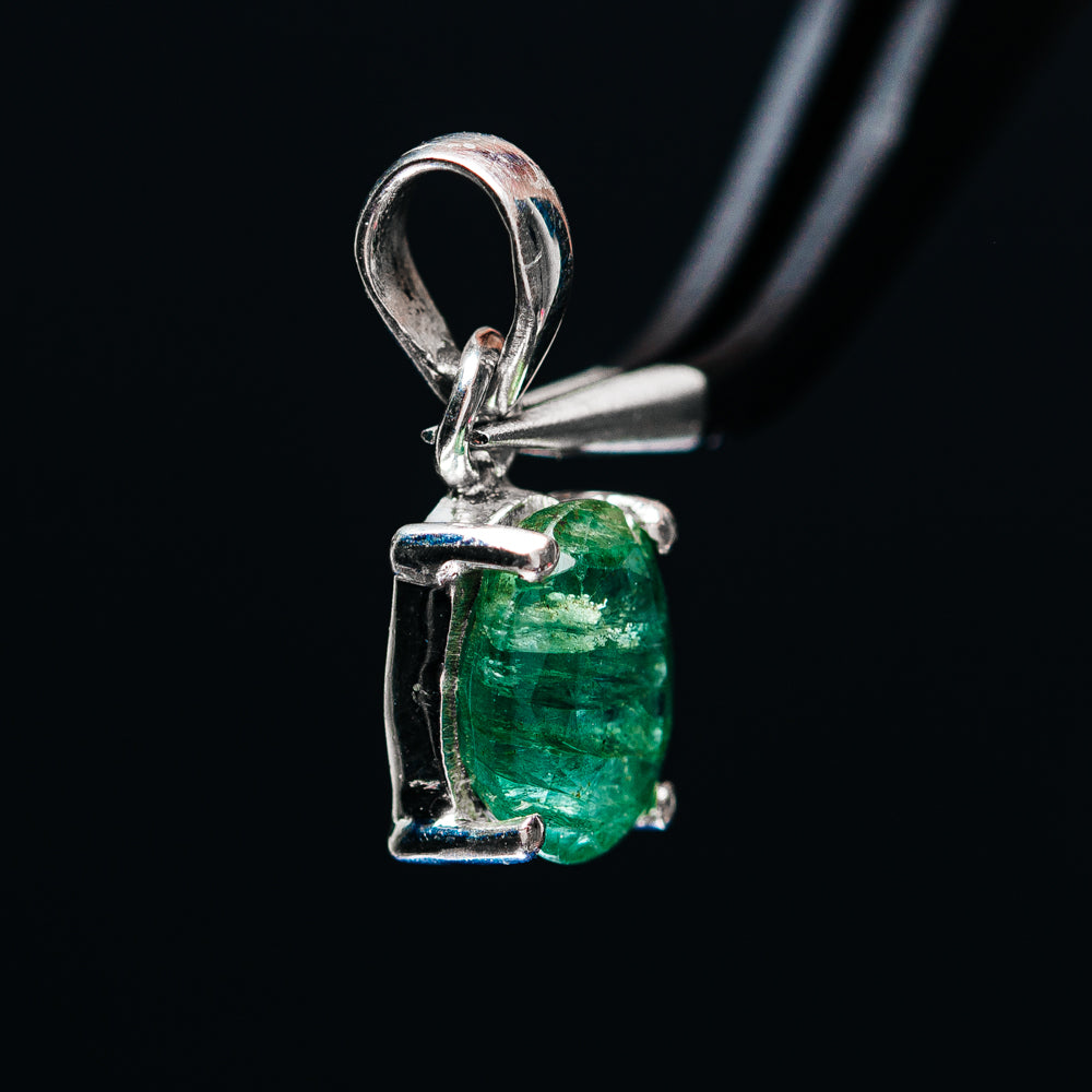 Sterling silver emerald pendant with rectangular bail and faceted green stone