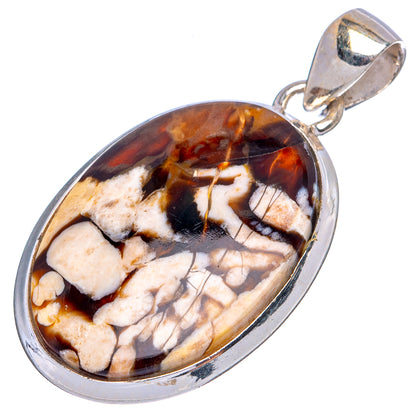 Oval jasper pendant on silver bail, featuring amber, tan, and dark brown marbling