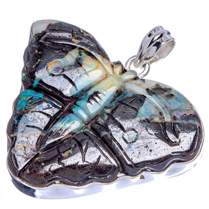 Large opal butterfly pendant with dark base, blue/yellow iridescent wings, silver bail