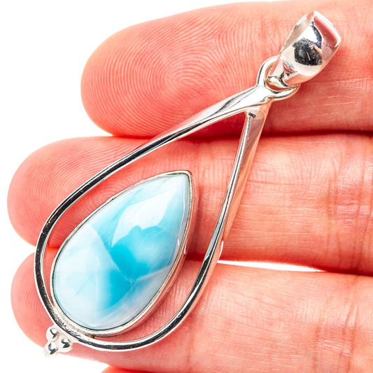 Sterling silver larimar pendant with light blue teardrop cabochon and side bail loops