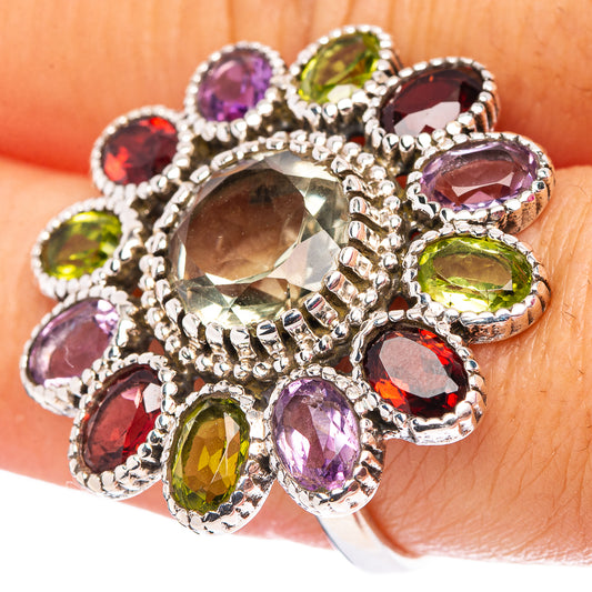 Sterling silver multi-gem flower ring with round and oval stones in purple, green, red.